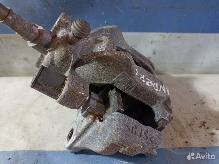 Суппорт тормозной передний правый Renault Sandero