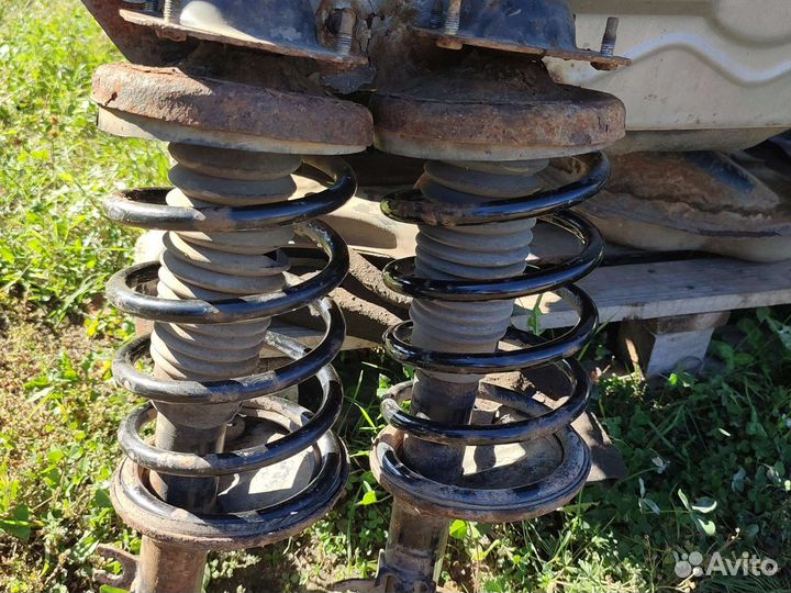 Kia sephia стойки передние