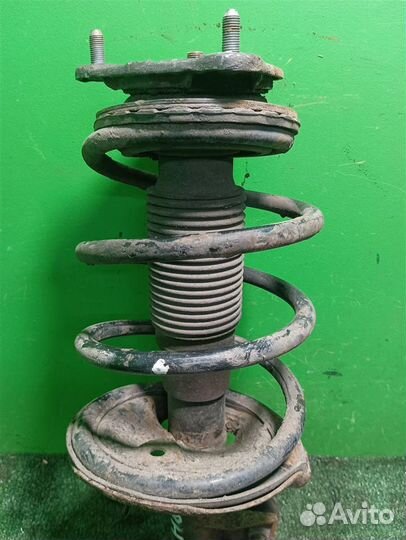 Стойка амортизатора передняя левая KIA ceed (ED)