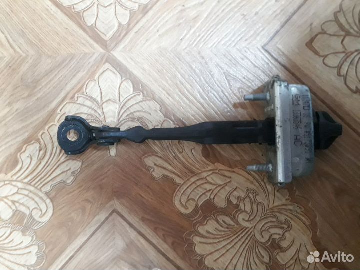 Ограничитель двери передней Opel Astra J