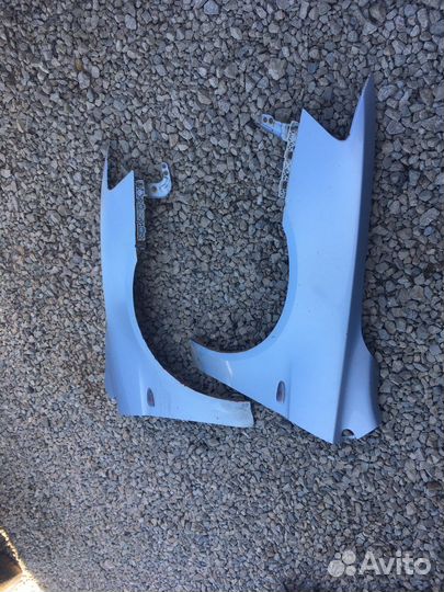 Mitsubishi lancer 10 переднее крыло