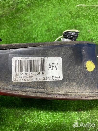 Фонарь в крышку левый Opel Astra J универсал