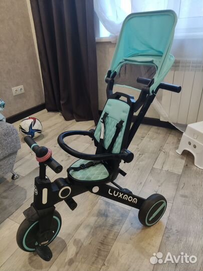 Трёхколёсный велосипед luxmom с родительской ручко