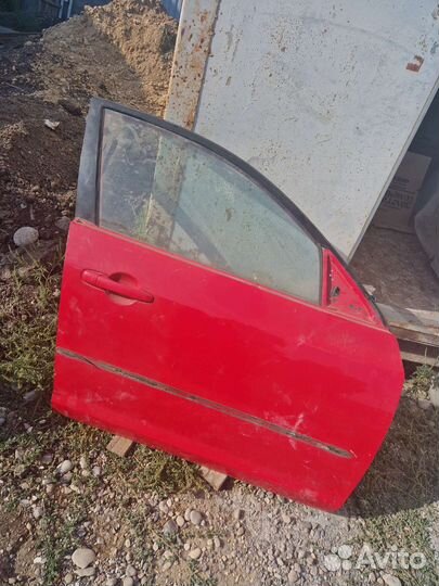 Передняя правая дверь мазда 3 бк хетчбек