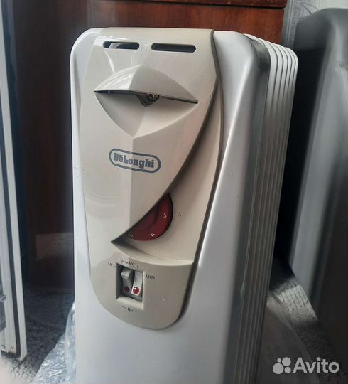 Масляный обогреватель delonghi