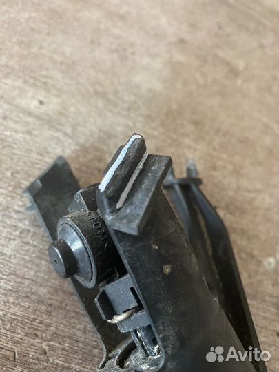 Форсунка омывателя фары левая Note (E11)