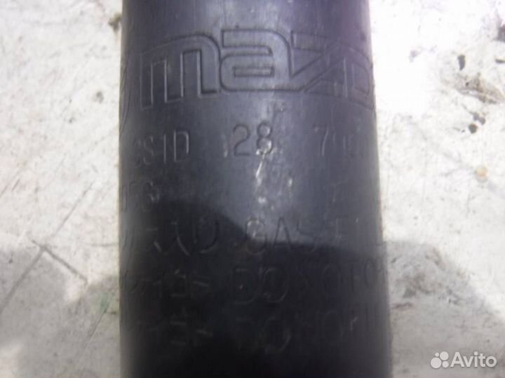 Амортизатор задний Мазда