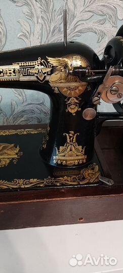 Швейная машинка Зингер