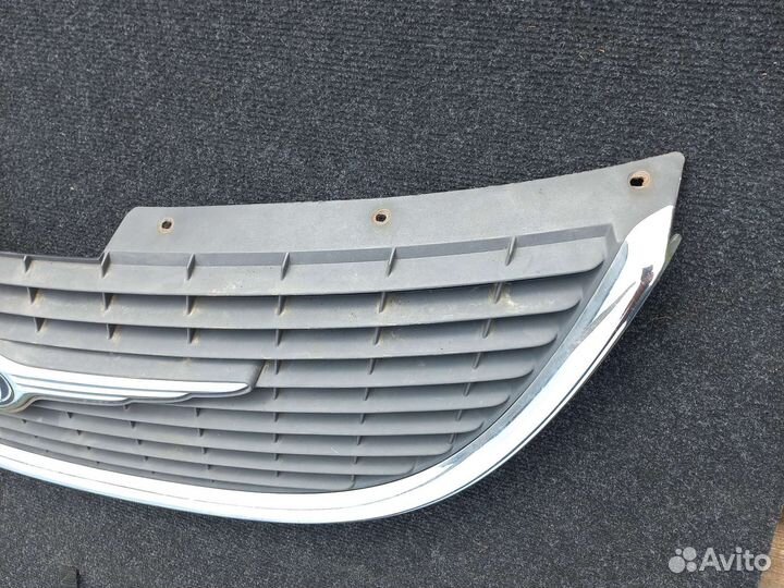 Chrysler Voyager(01-07)решётка 4857300AA радиатора