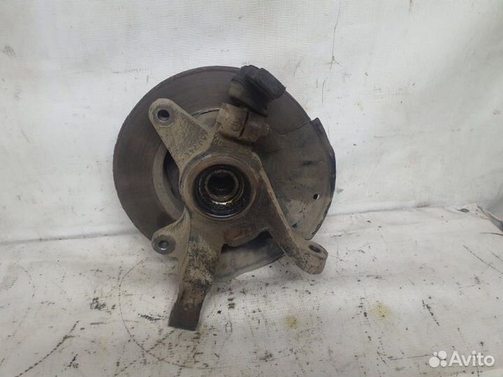 Поворотный кулак передний левый Kia Spectra седан