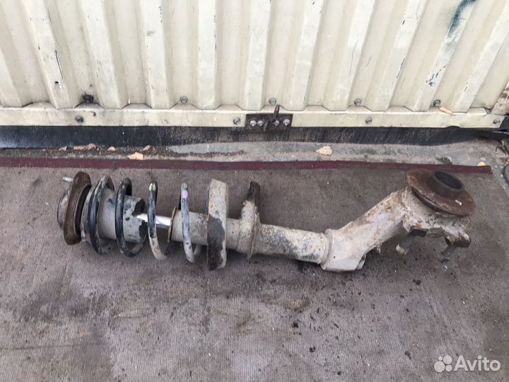 Стойка амортизатор левая Daewoo Nexia