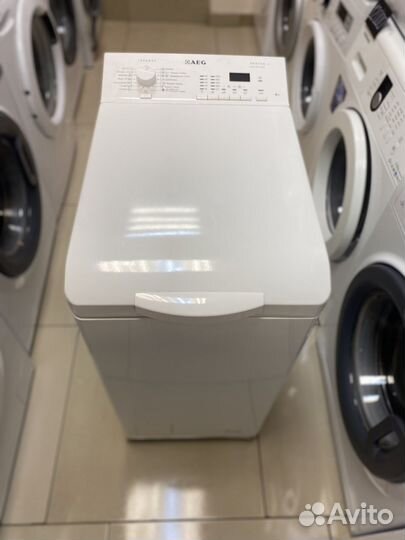 Стиральная машина с вертикальной загрузкой AEG