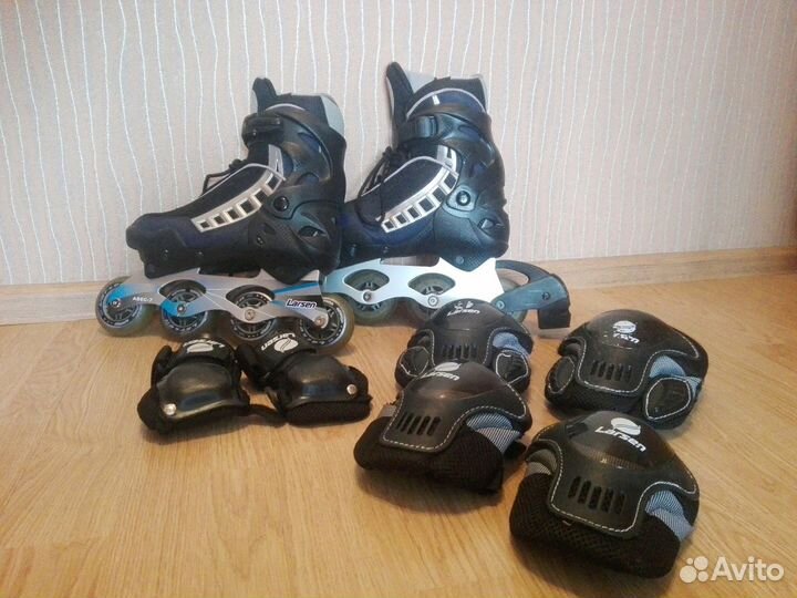 Роликовые коньки