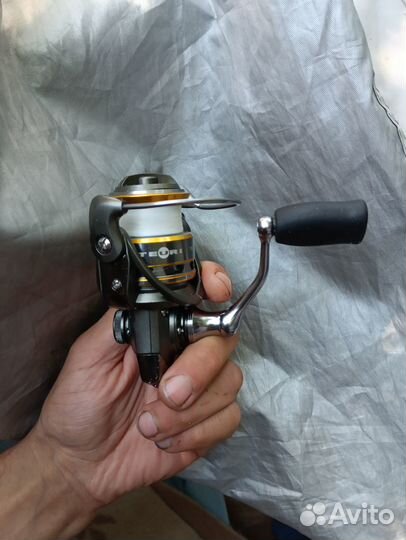 Катушка спининга akara