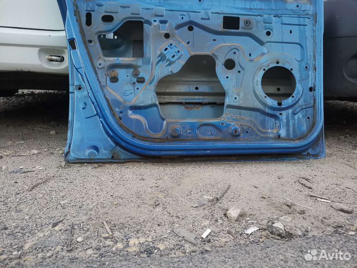 Дверь левая передняя logan