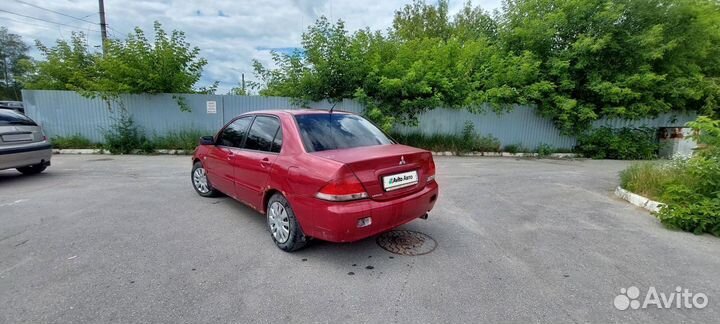 Mitsubishi Lancer 1.6 МТ, 2006, 297 000 км