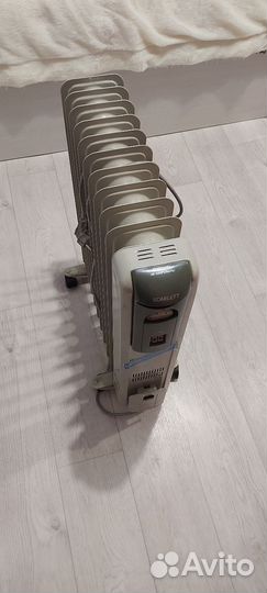 Масляный обогреватель