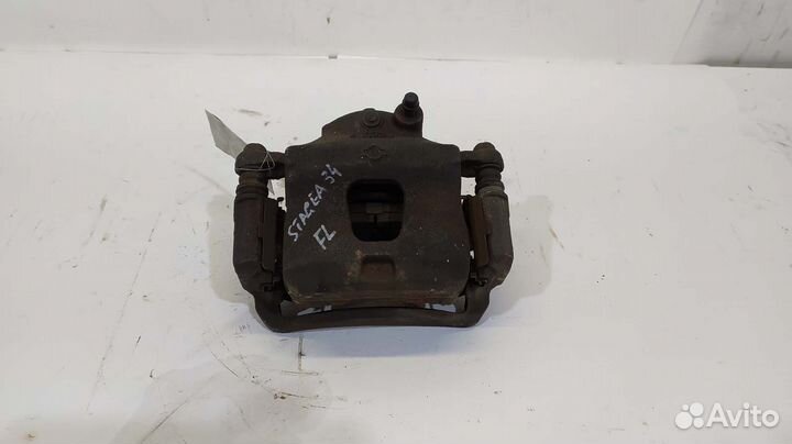 Суппорт тормозной nissan Laurel GC35 RB25DE передн