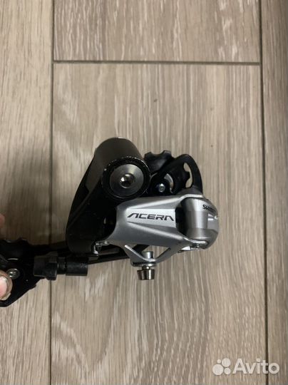 Переключатель задний Shimano RD M390 9ск