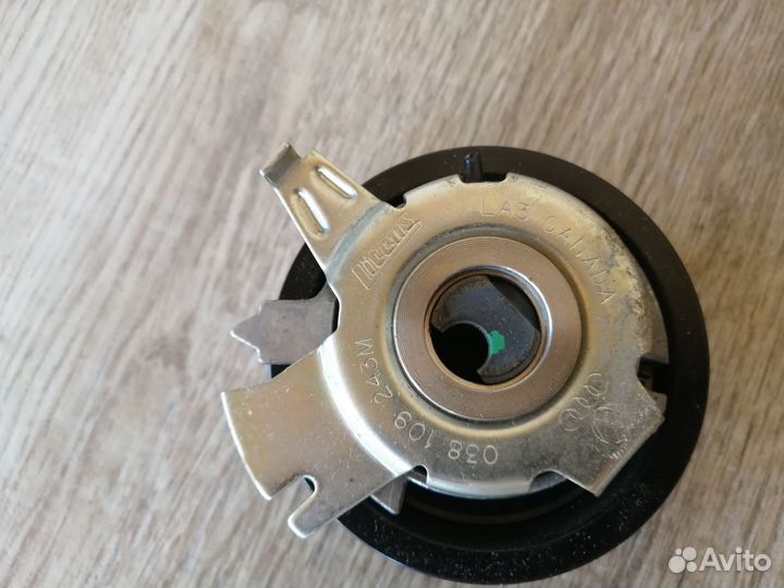 Ролик натежитель VAG 038109243M