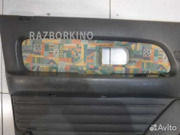 Обшивка двери передней левой