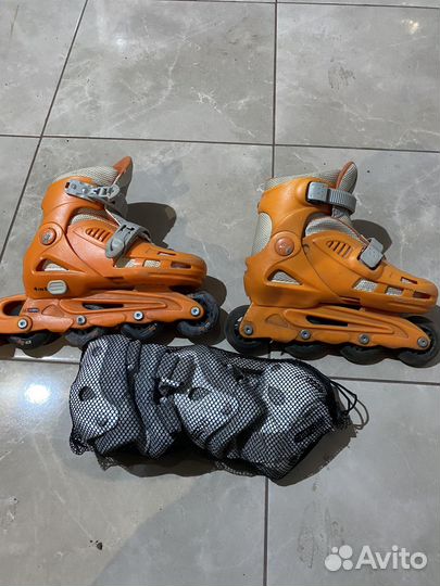 Коньки роликовые