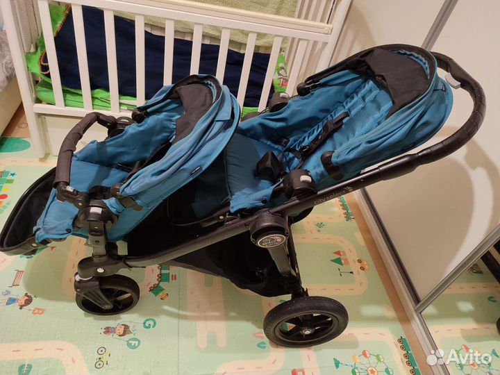 Коляска для двойни / погодок Baby Jogger