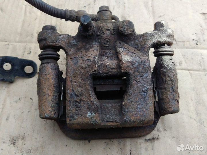 Суппорт задний левый Nissan Qashqai Vi HR16DE 2007