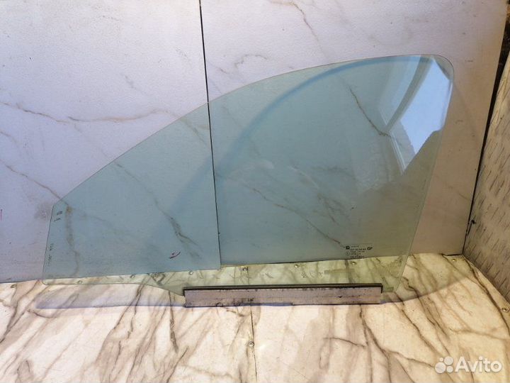 Стекло двери переднее левое Opel 1999