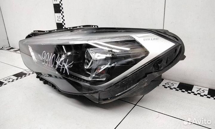 Фара левая BMW X1