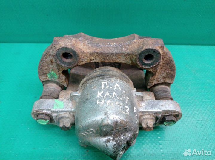 Суппорт тормозной передний левый Лада Калина 1