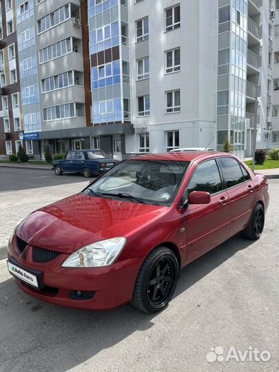 Mitsubishi Lancer 1.6 МТ, 2004, битый, 243 000 км