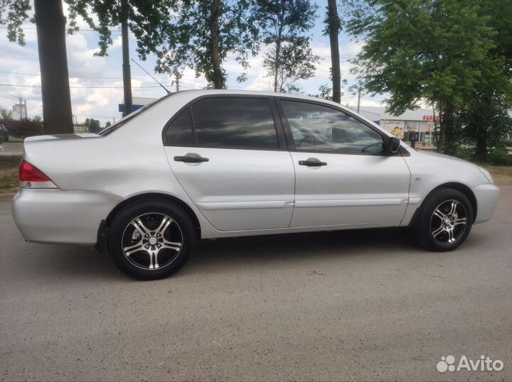Mitsubishi Lancer 1.3 МТ, 2005, 193 000 км
