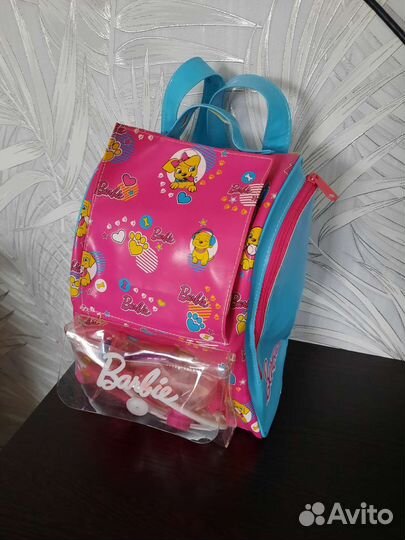 Собачка Barbie в рюкзаке