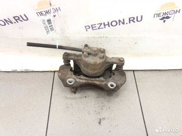 Суппорт тормозной передний левый Mitsubishi Lancer