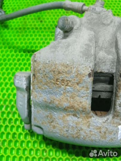 Суппорт правый volkswagen Passat B7 передний