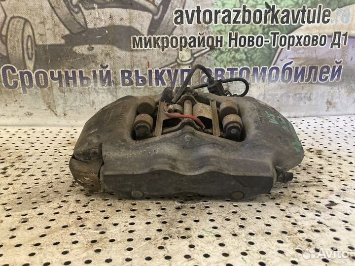 Суппорт тормозной задний левый Audi Q7