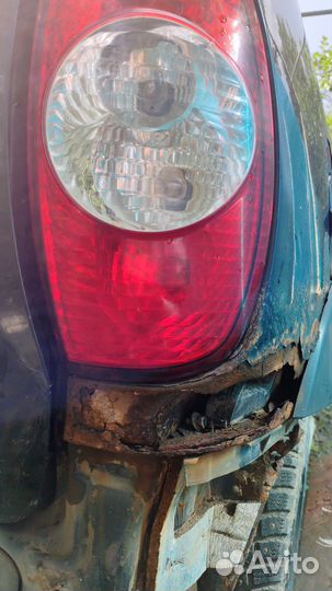 Фонарь нива шевроле бертон правый