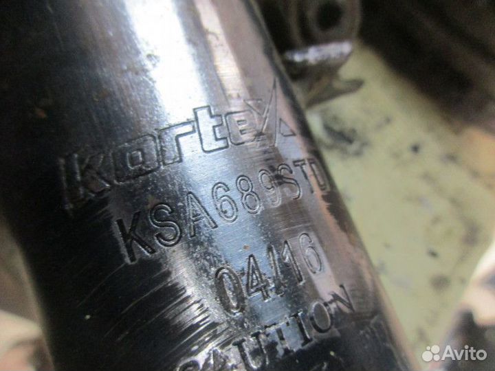 Амортизатор передний левый Opel Astra H / Family 2