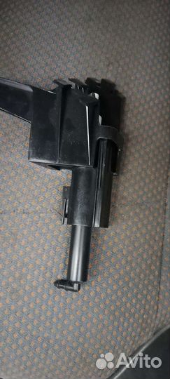 28612-br00А,Форсунка омывателя фар осталас правая