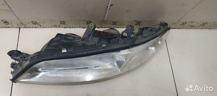 Фара левая Opel Vectra