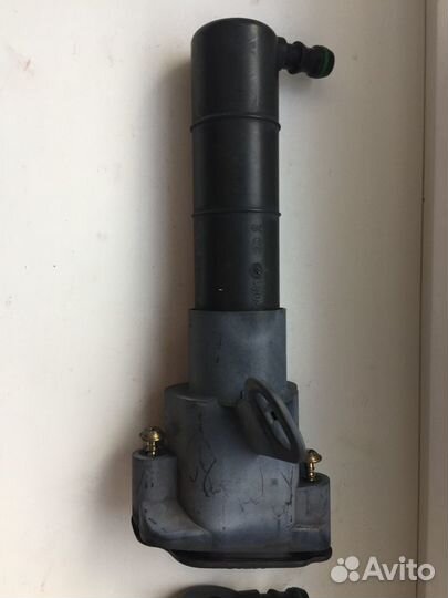 Форсунка омывателя фар