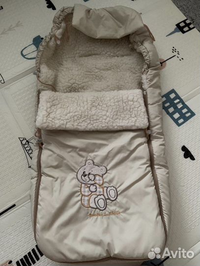 Меховой конверт в коляску овчина