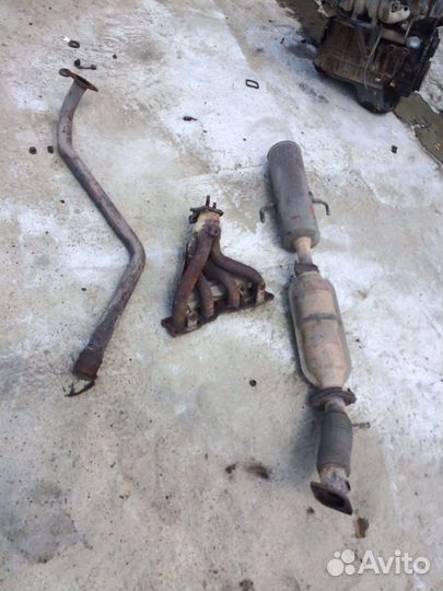 Kia cerato 2 koup коллектор выпускной