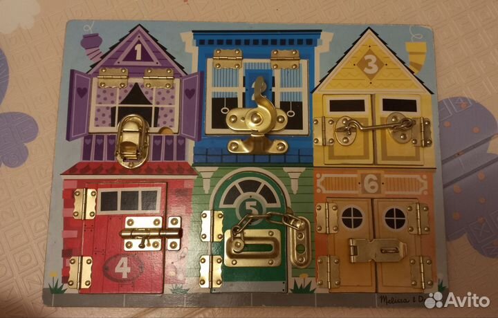 Бизиборд Melissa doug с замочками