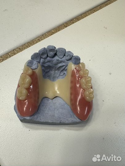 Зубной техник