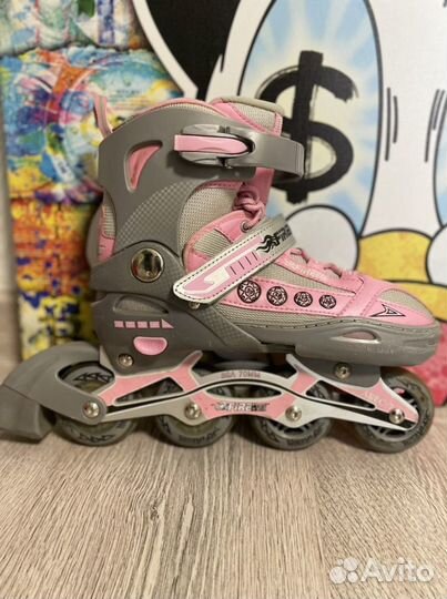 Роликовые коньки