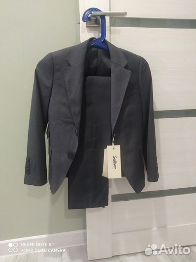 Костюм.Пиджак и брюки для мальчика.128 размер