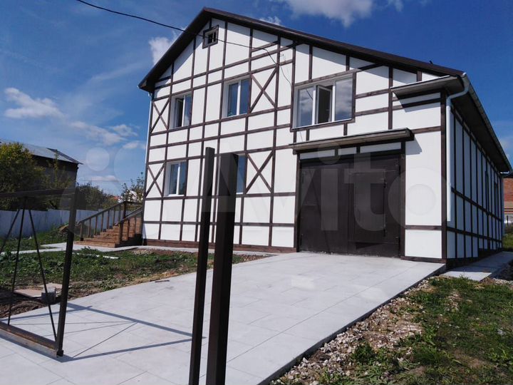 Коттедж 240 м² на участке 12 сот.