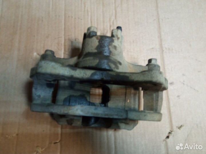 Суппорт передний правый Mitsubishi Lancer 10 CX